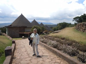 Sandi with rooms in background